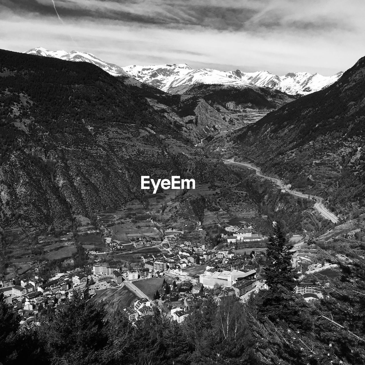 High angle view of snowcapped mountains against sky