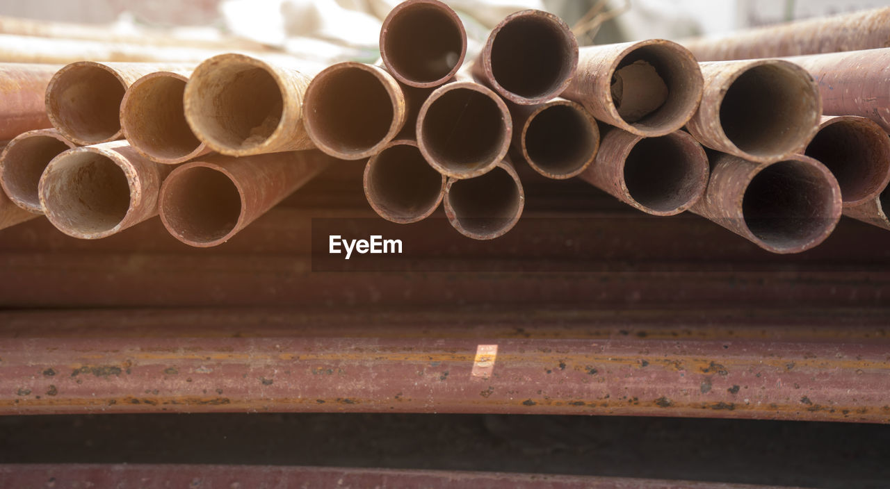 Close-up of rusty pipes in factory