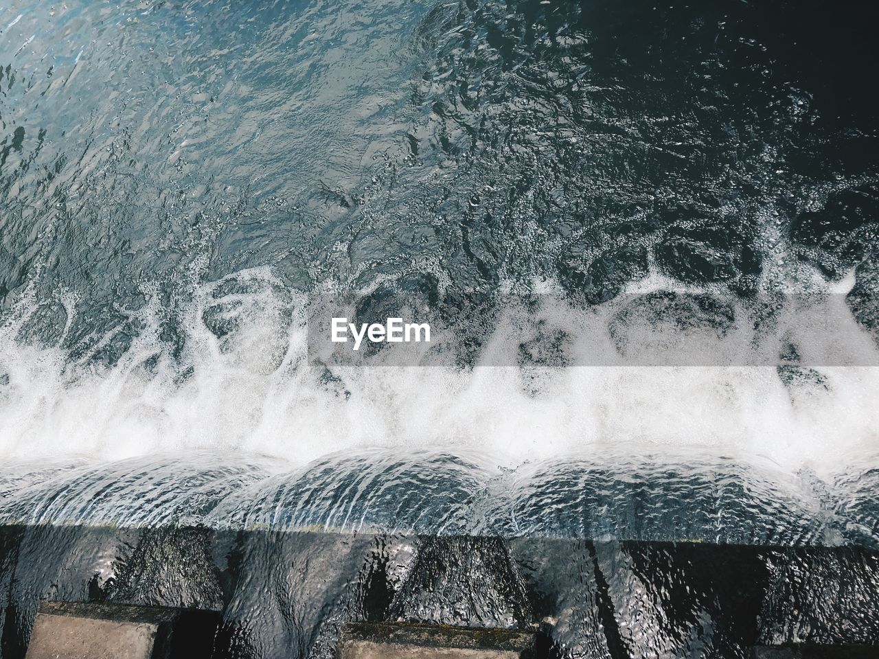 SEA WAVES SPLASHING ON SHORE
