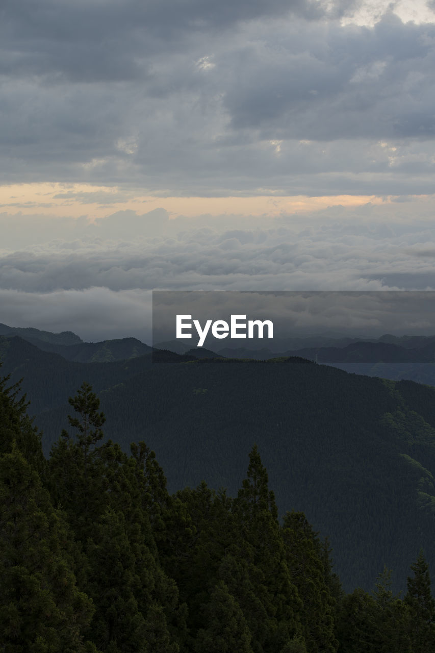 Scenic view of mountains against sky during sunset