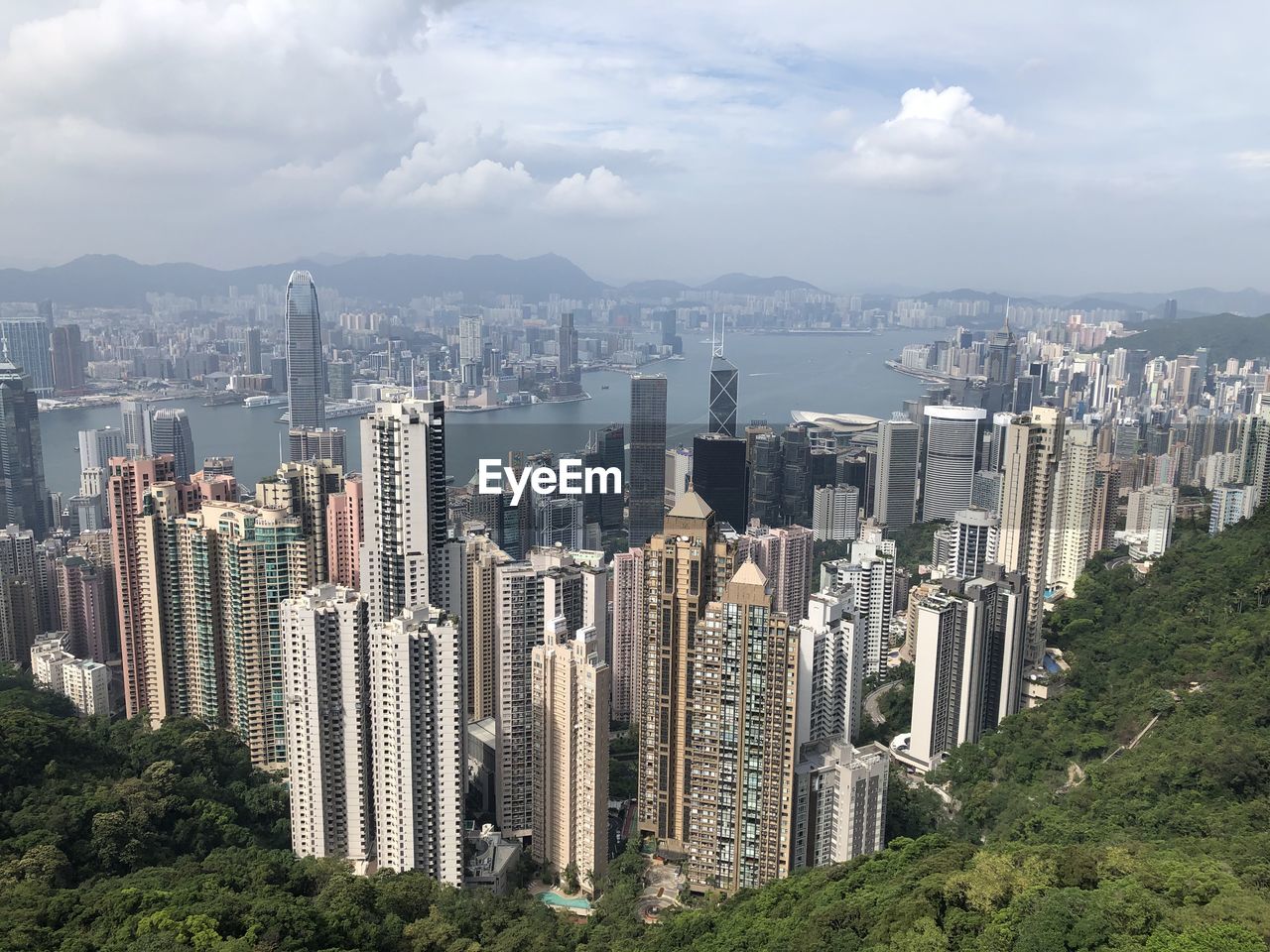 High angle view of buildings in city against sky