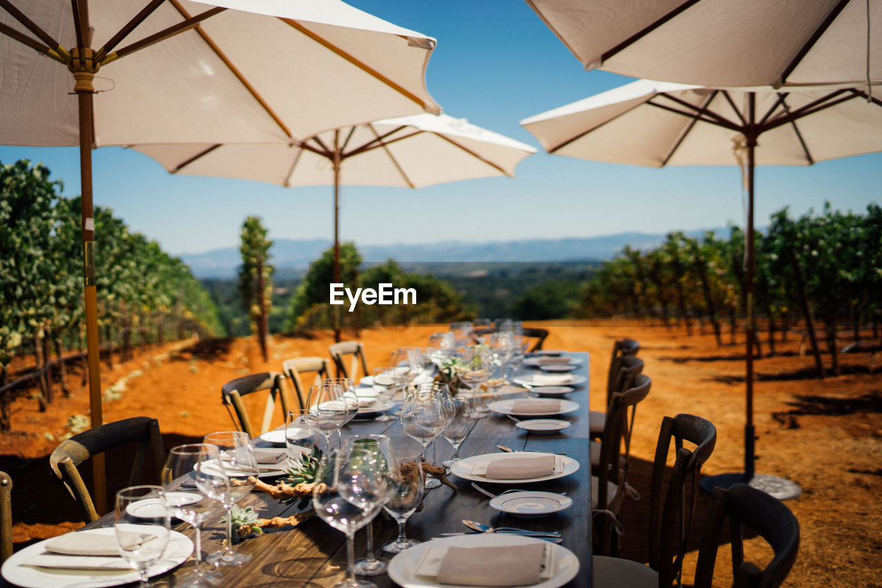 Empty chairs and tables at restaurant