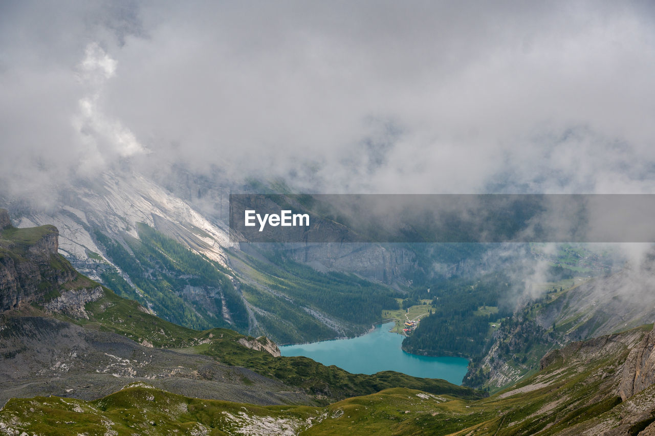 AERIAL VIEW OF MOUNTAIN AGAINST SKY