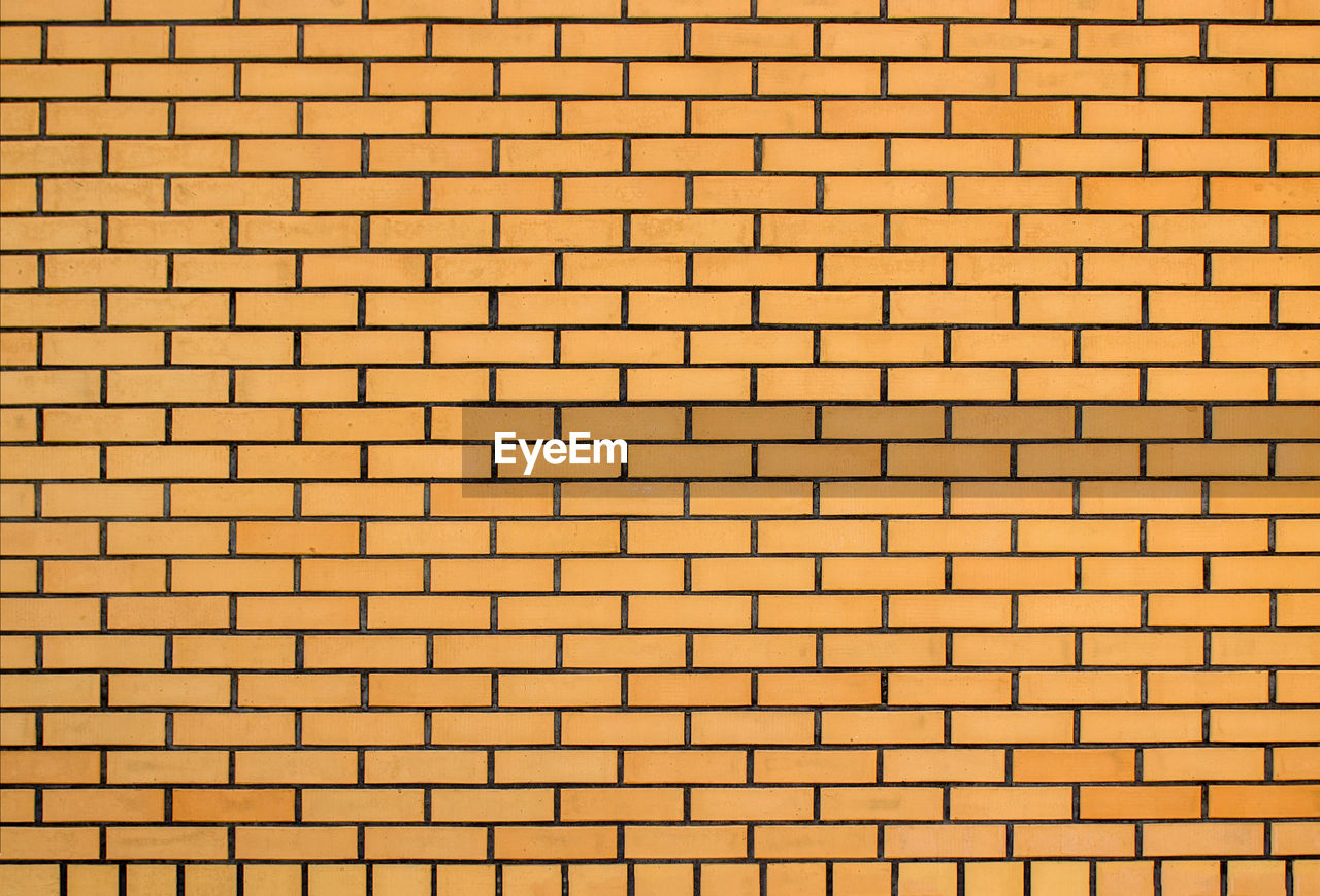 Background of old vintage brick wall texture