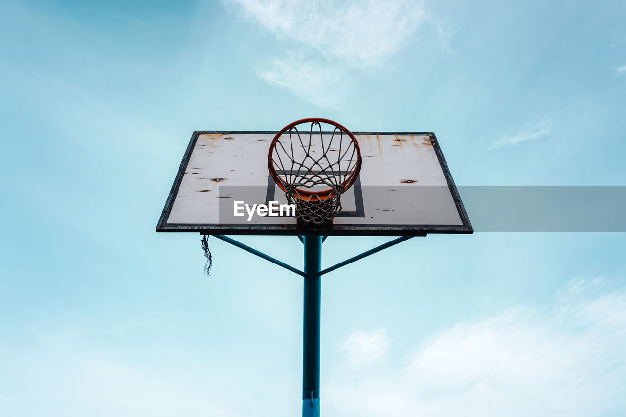 Street basketball hoop and blue sky