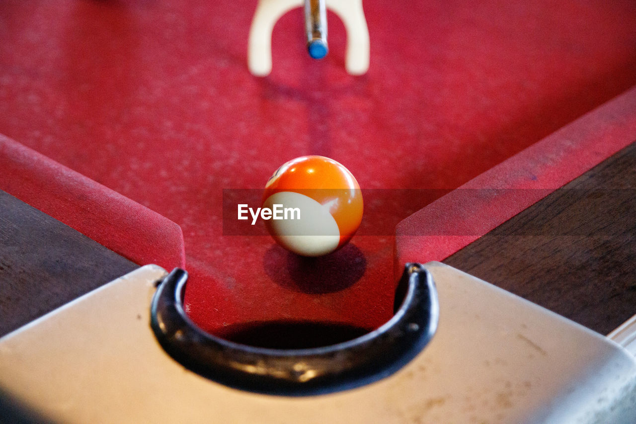 red, sports, billiards, ball, indoors, pool ball, close-up, table, no people, food, billiard table, food and drink, game, pool table, egg, leisure activity