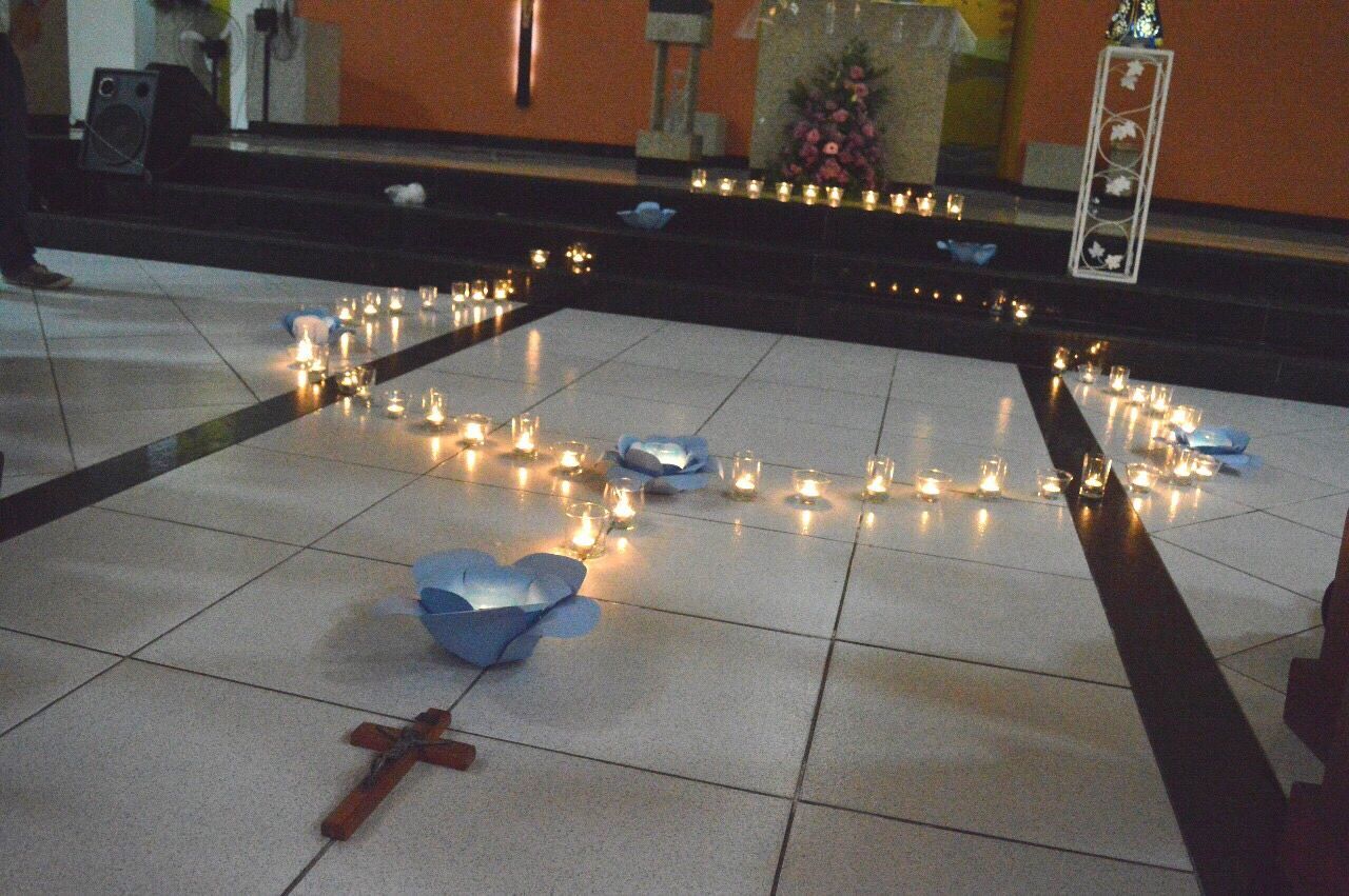 ILLUMINATED ELECTRIC LIGHTS ON TILED FLOOR AT NIGHT