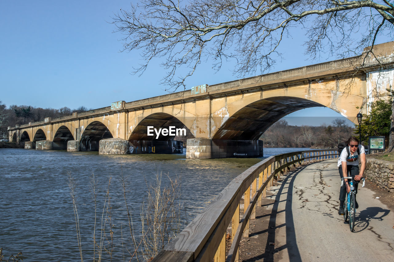 VIEW OF BRIDGE OVER RIVER AGAINST SKY