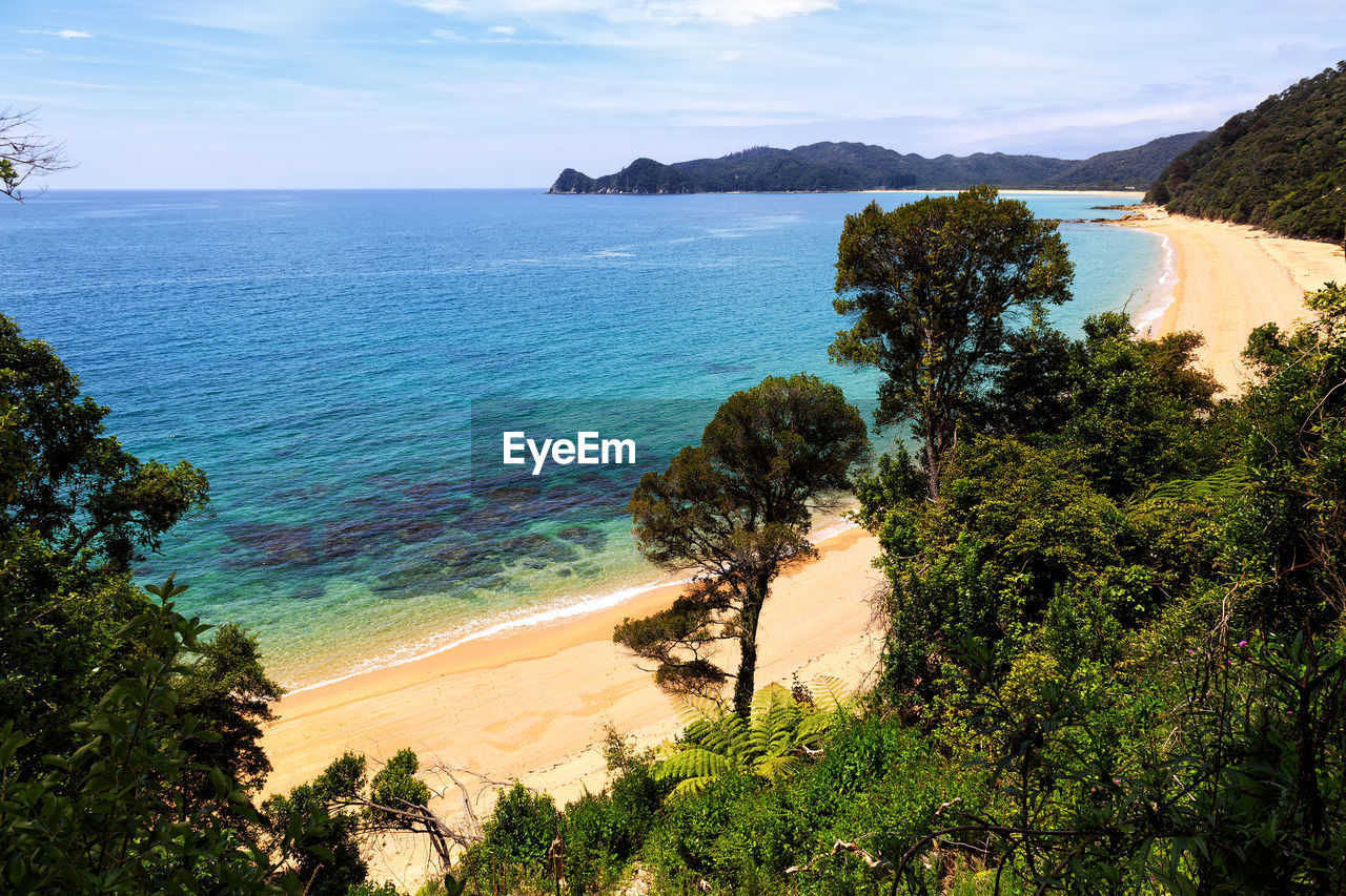 Scenic view of calm sea against blue sky