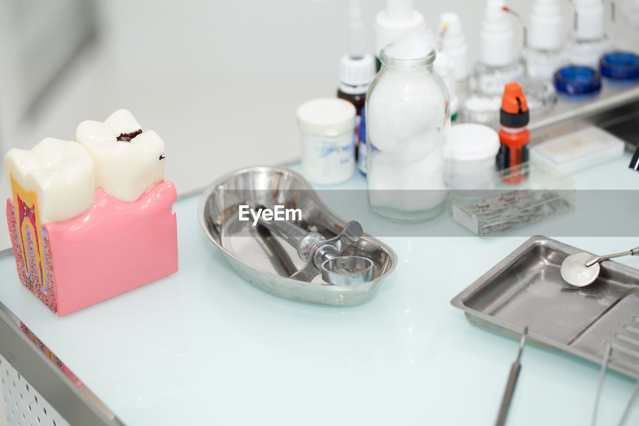 Close-up of dental equipment on table