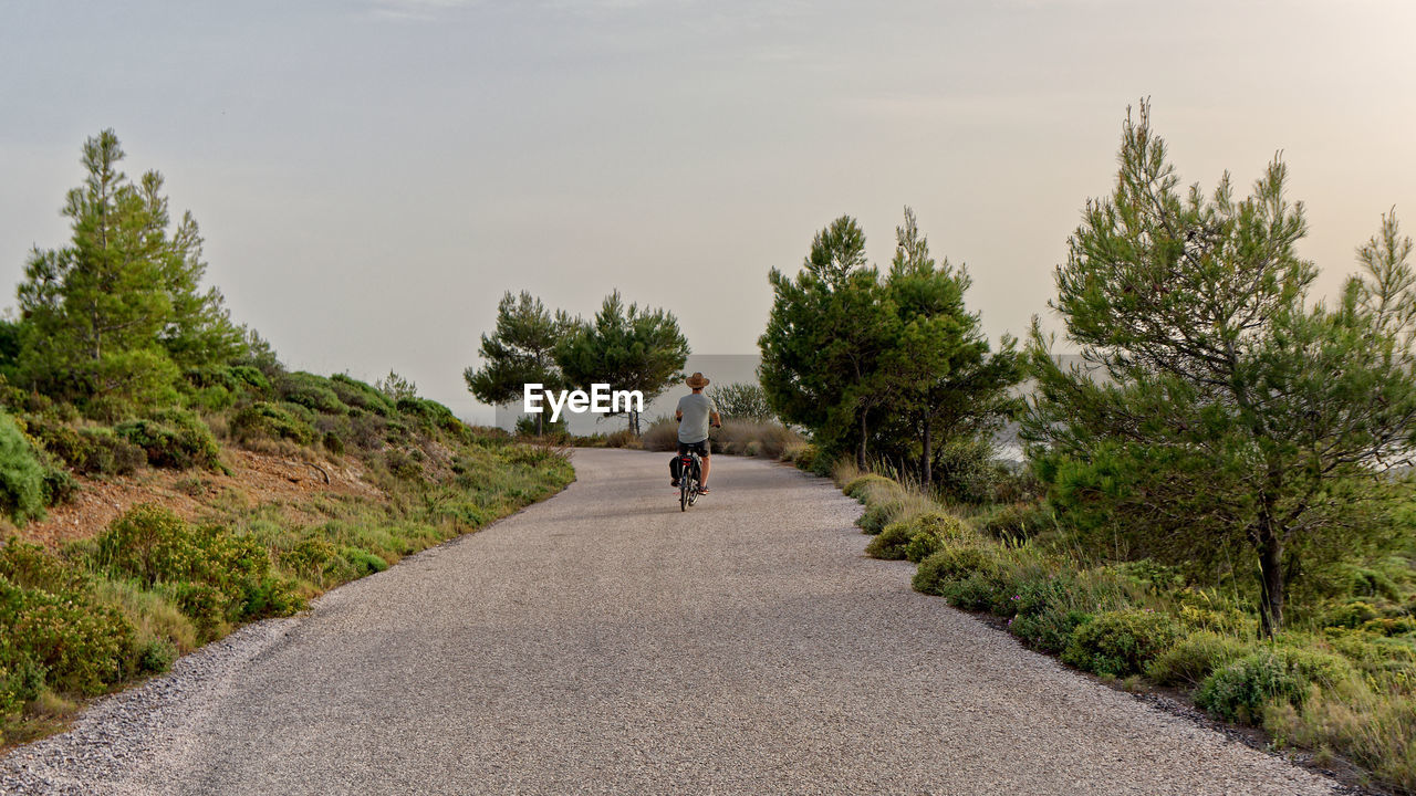 Bicycle trip in sounion national park, south of athens in attiki, with the ancient poseidon temple