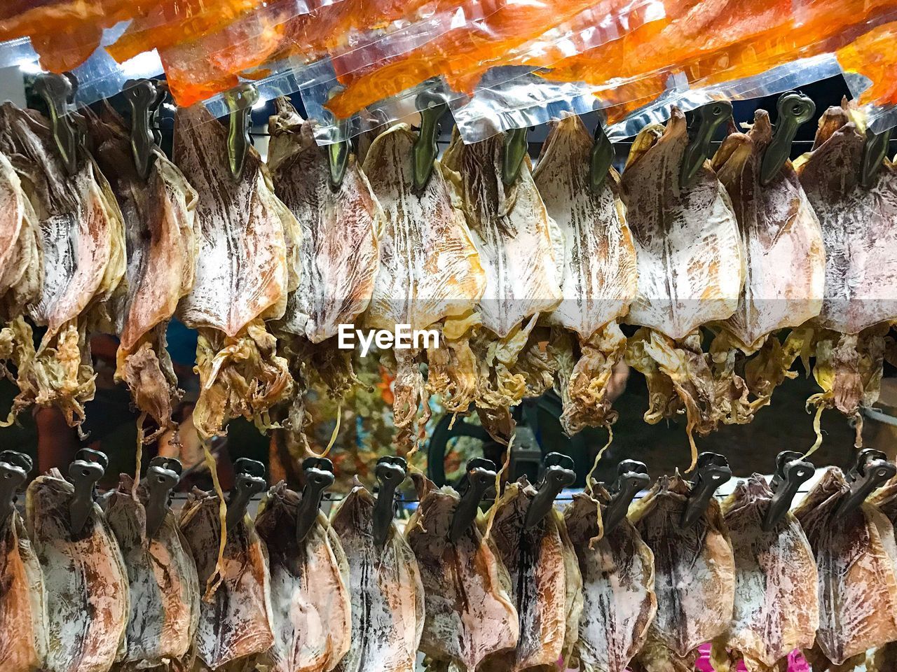 CLOSE-UP OF FISH FOR SALE AT MARKET STALL