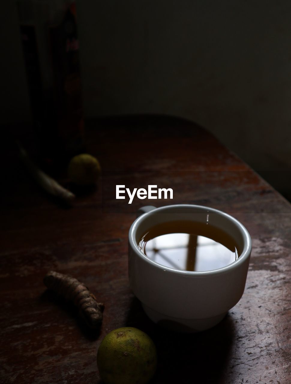 High angle view of coffee cup on table