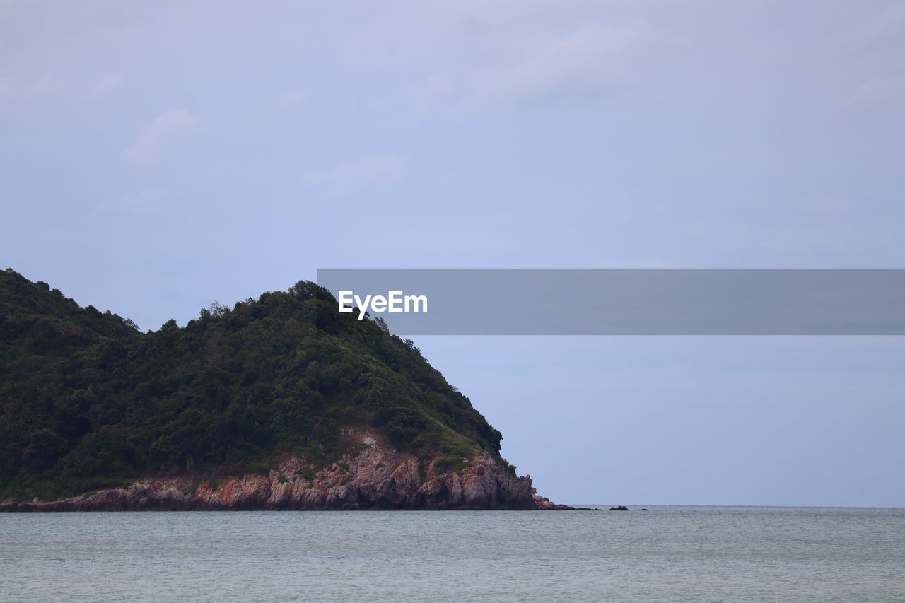 water, sea, sky, land, body of water, scenics - nature, beauty in nature, coast, nature, ocean, shore, beach, tranquility, no people, rock, environment, horizon, tranquil scene, bay, travel destinations, cloud, landscape, mountain, travel, coastline, island, cliff, outdoors, idyllic, islet, seascape, tourism, terrain, non-urban scene, day, blue, holiday, trip, bay of water, vacation