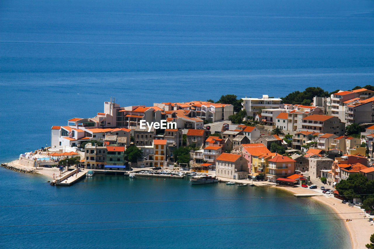 High angle view of town on sea