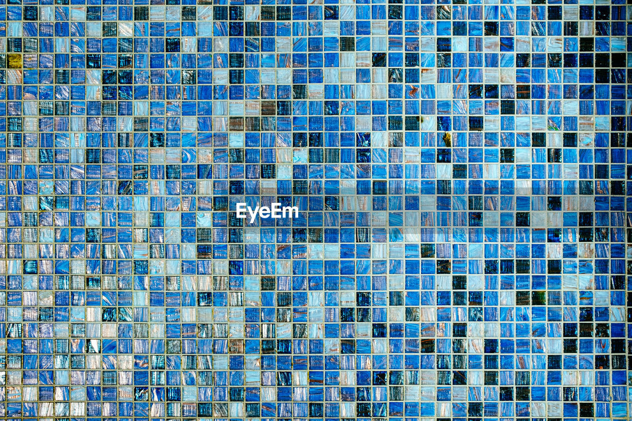 Abstract full frame texture shot of blue mosaic tiles
