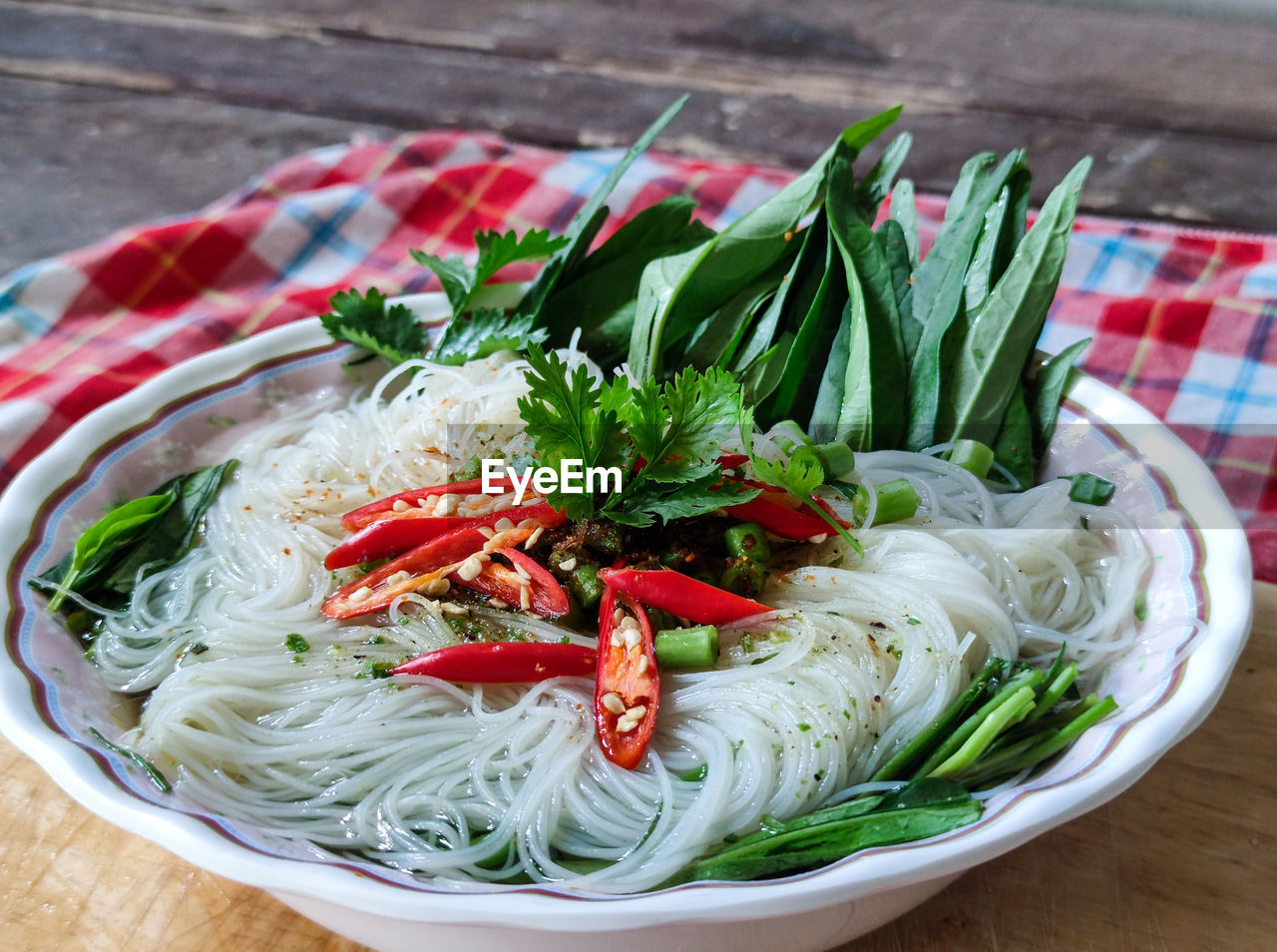 food and drink, food, healthy eating, wellbeing, dish, vegetable, freshness, cuisine, italian food, spaghetti, pasta, no people, noodle, indoors, produce, bowl, meal, table, herb, high angle view, noodle soup, plate, fish, asian food, spice, close-up, seafood, still life, wood, salad