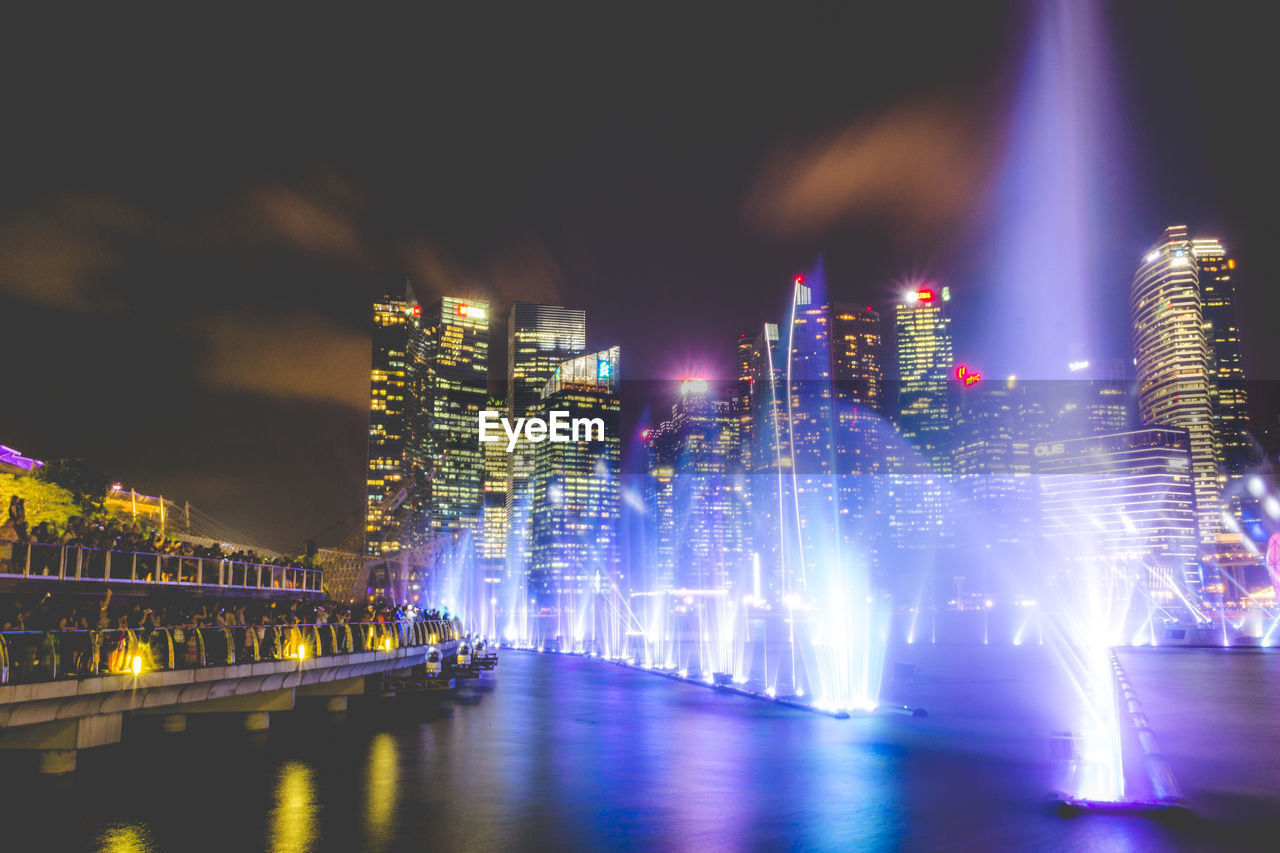 ILLUMINATED BUILDINGS AT NIGHT