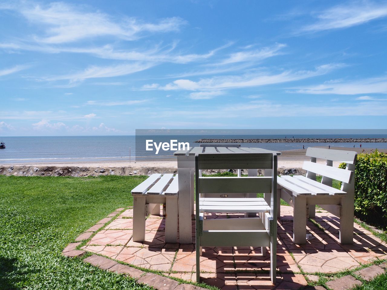 Lifeguard hut on beach against sky