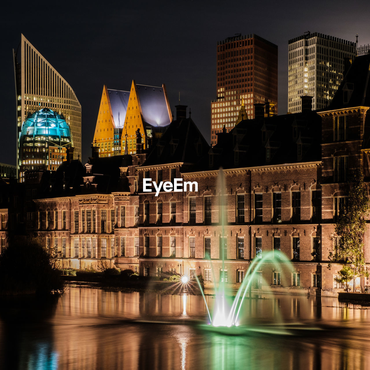 ILLUMINATED BUILDINGS AT NIGHT