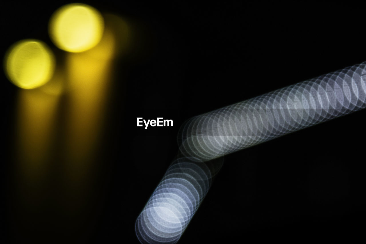 Defocused image of illuminated lights at night