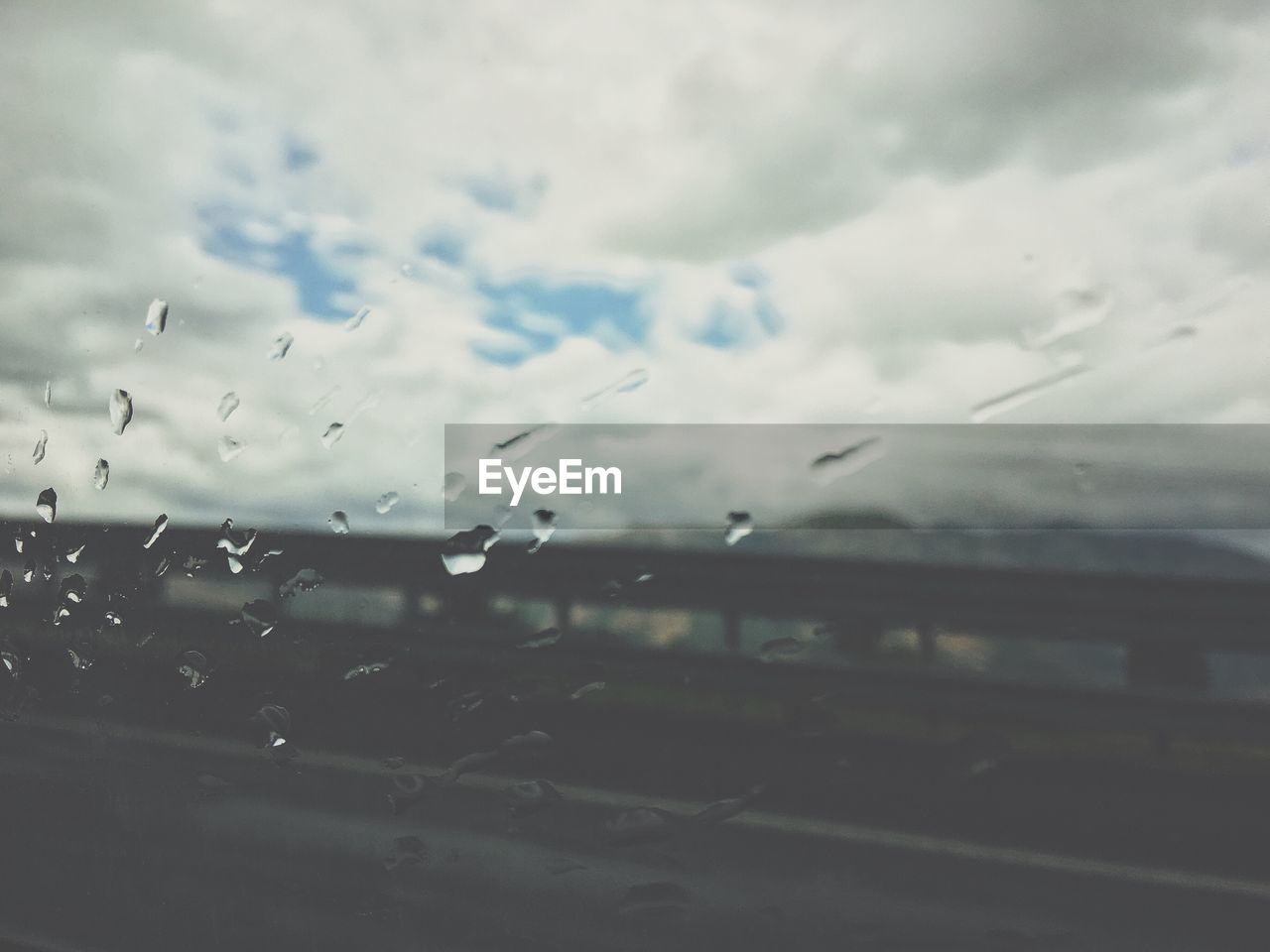 VIEW OF RAIN DROPS ON WINDOW