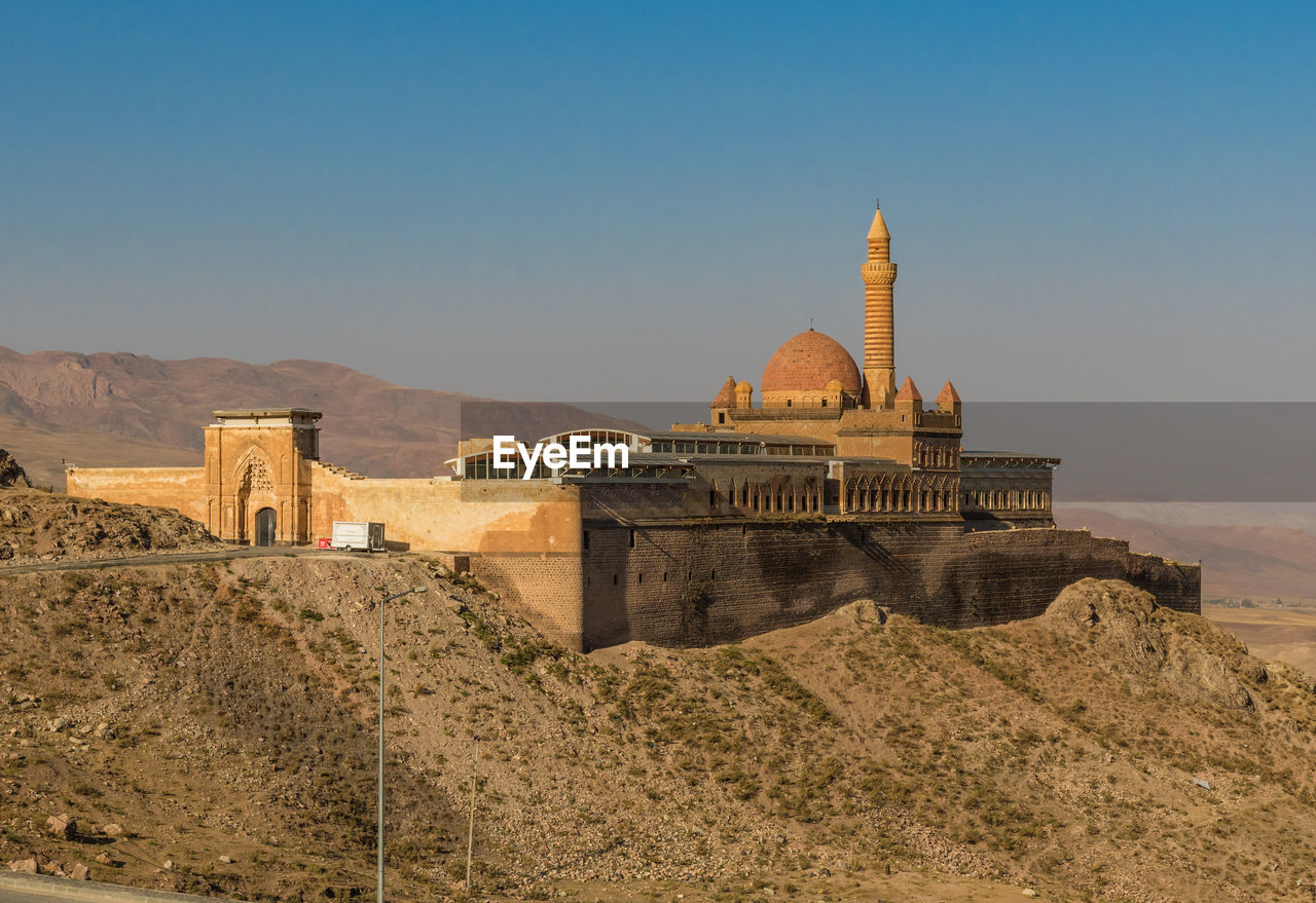 EXTERIOR OF TEMPLE AGAINST SKY