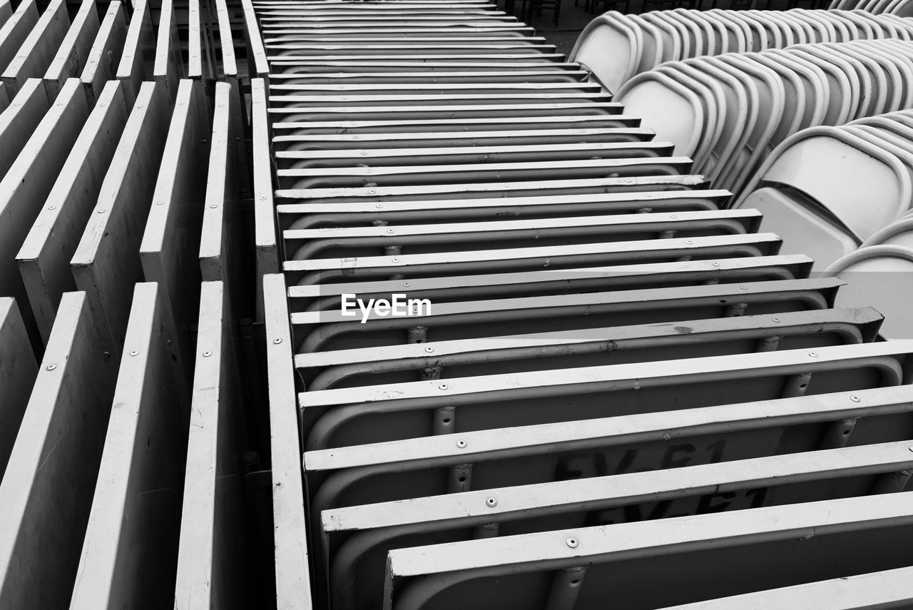 Stack of iron table and chairs 