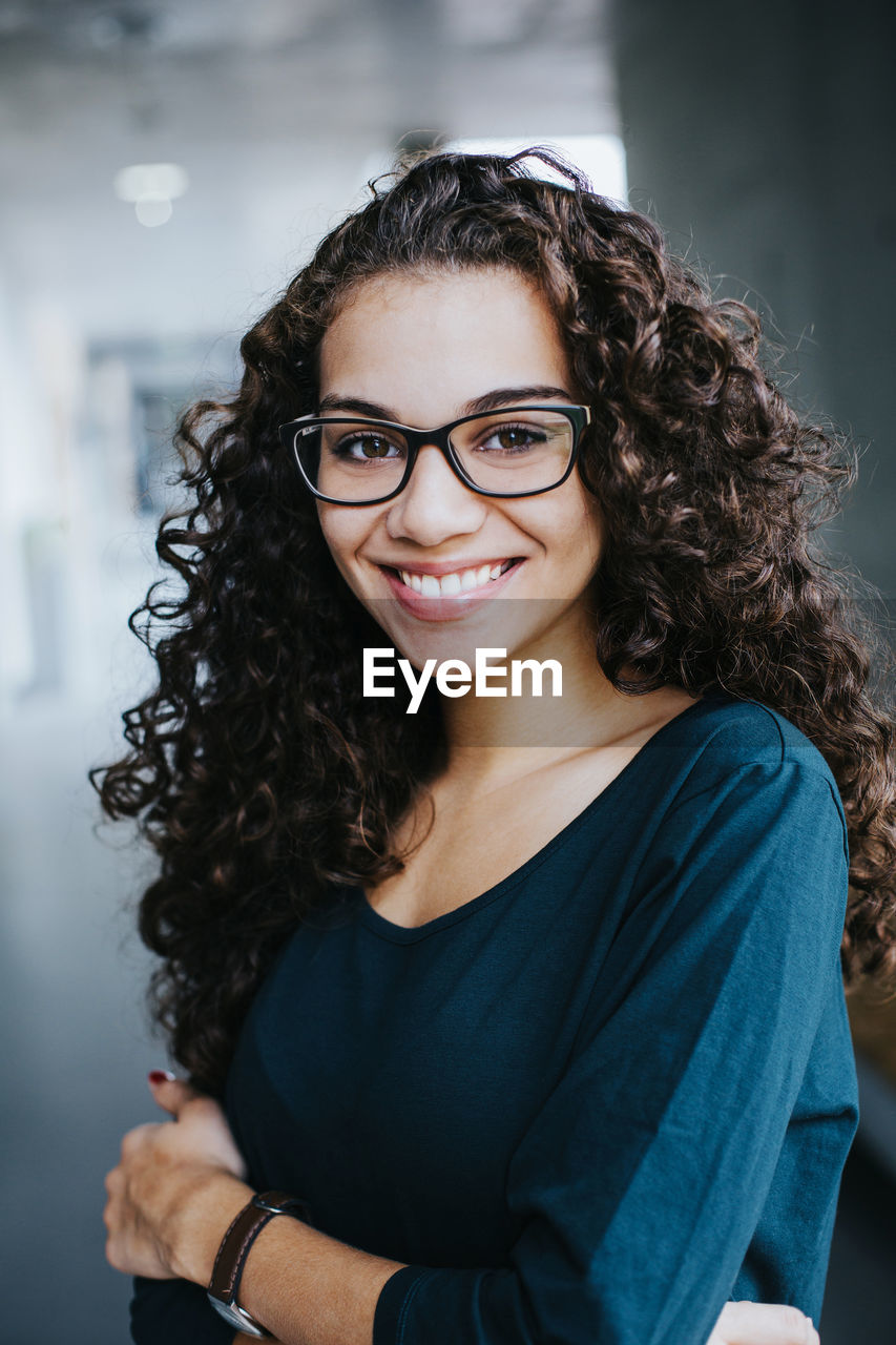 Portrait of smiling young woman