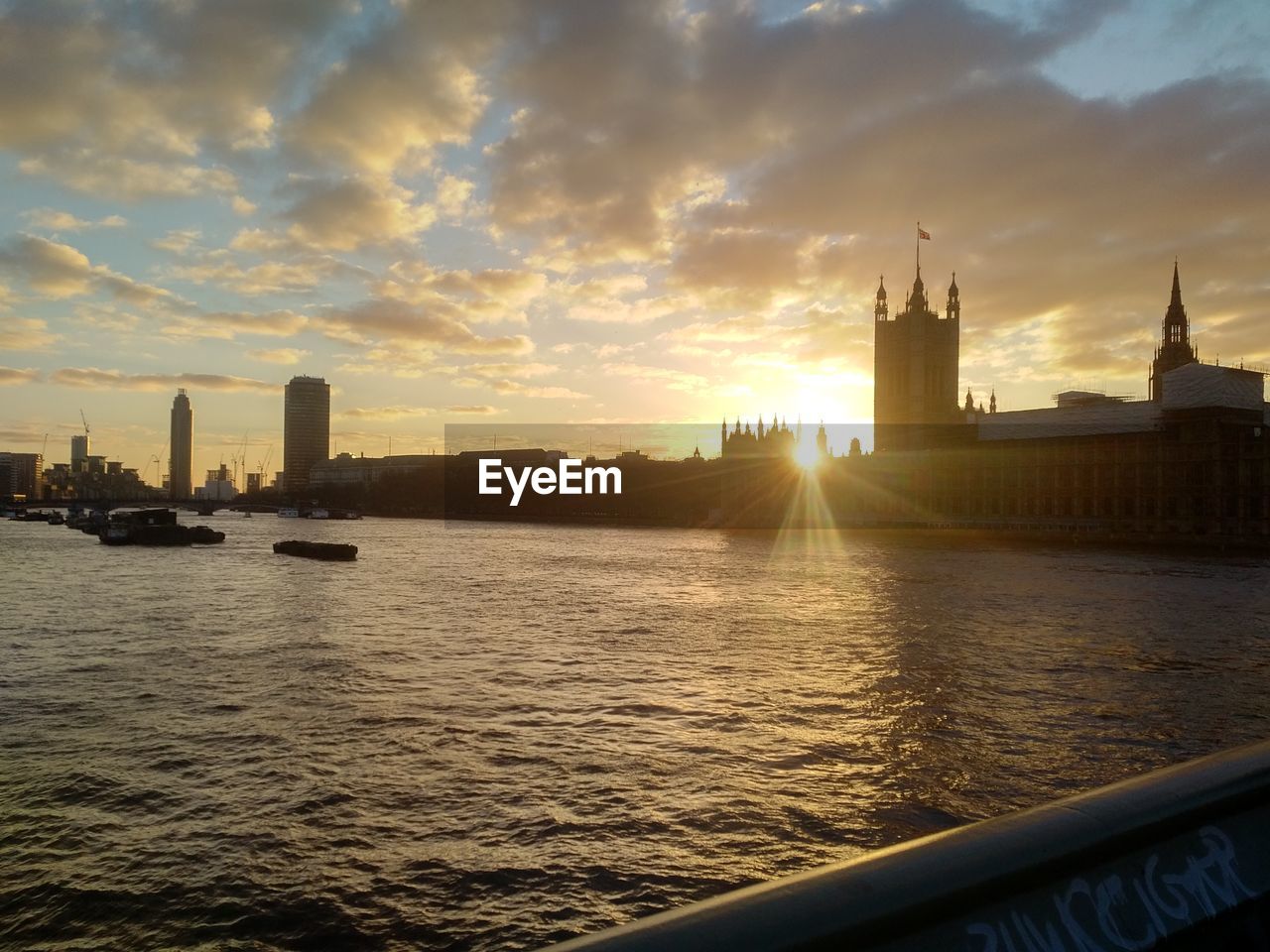 View of waterfront at sunset