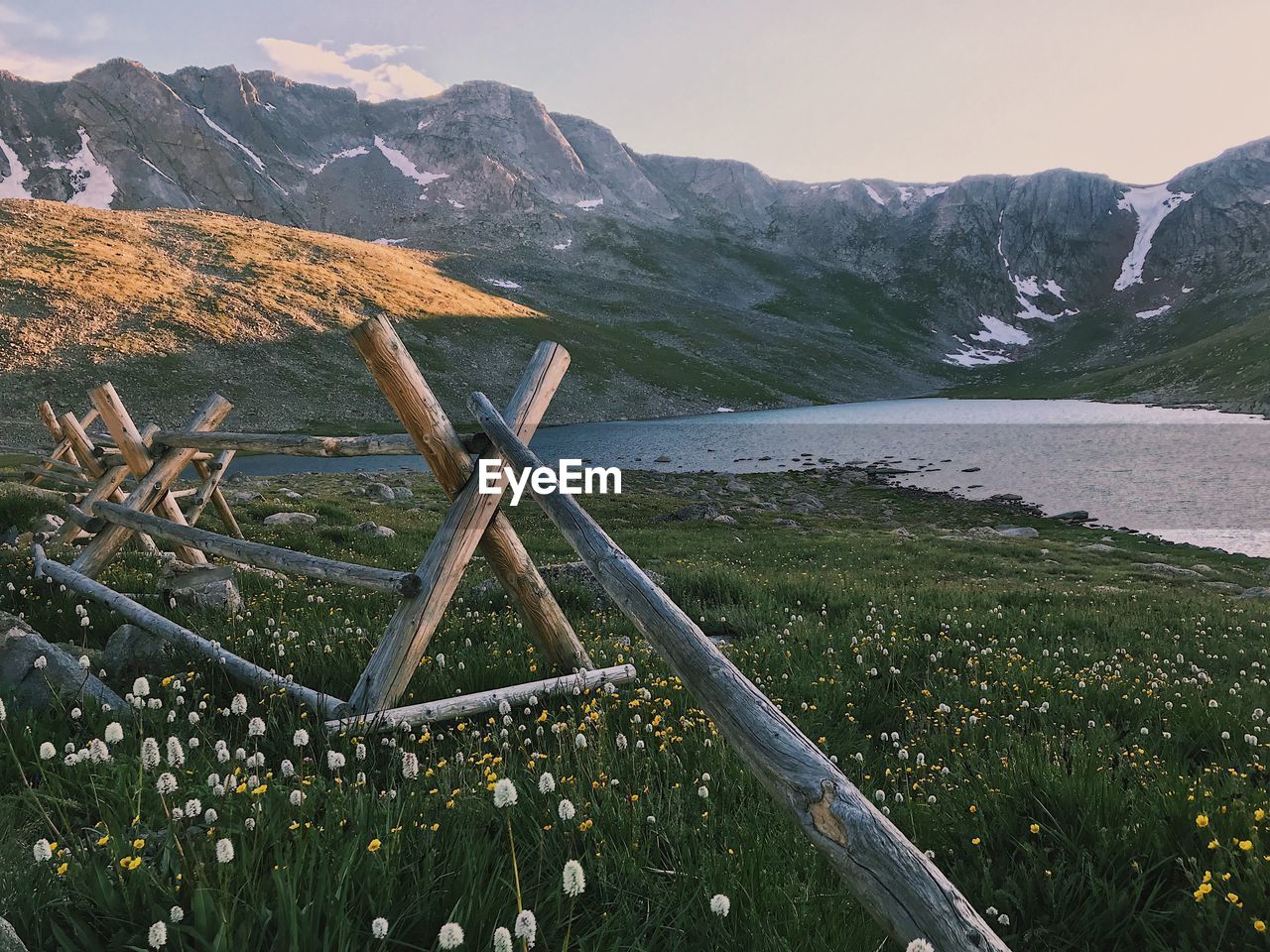 Scenic view of lake against mountain range