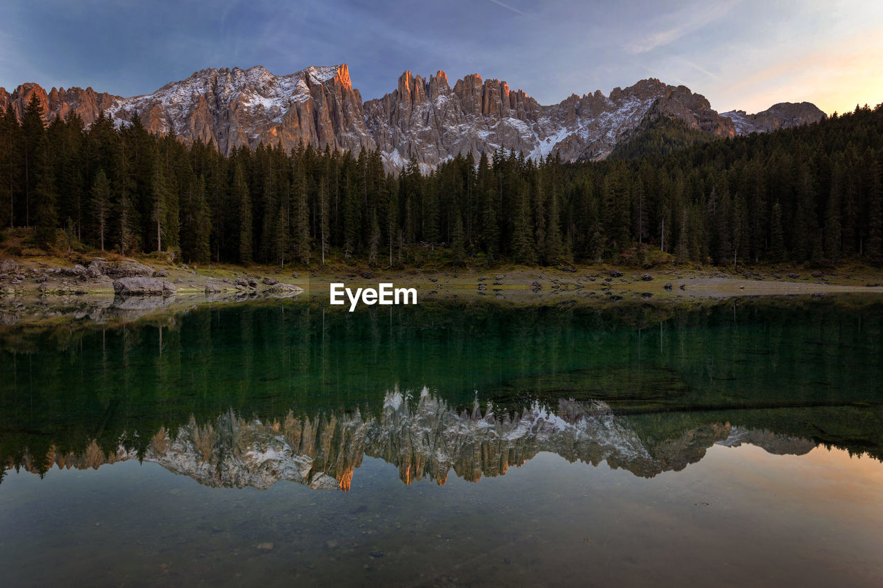 SCENIC VIEW OF LAKE BY TREES AGAINST SKY DURING WINTER
