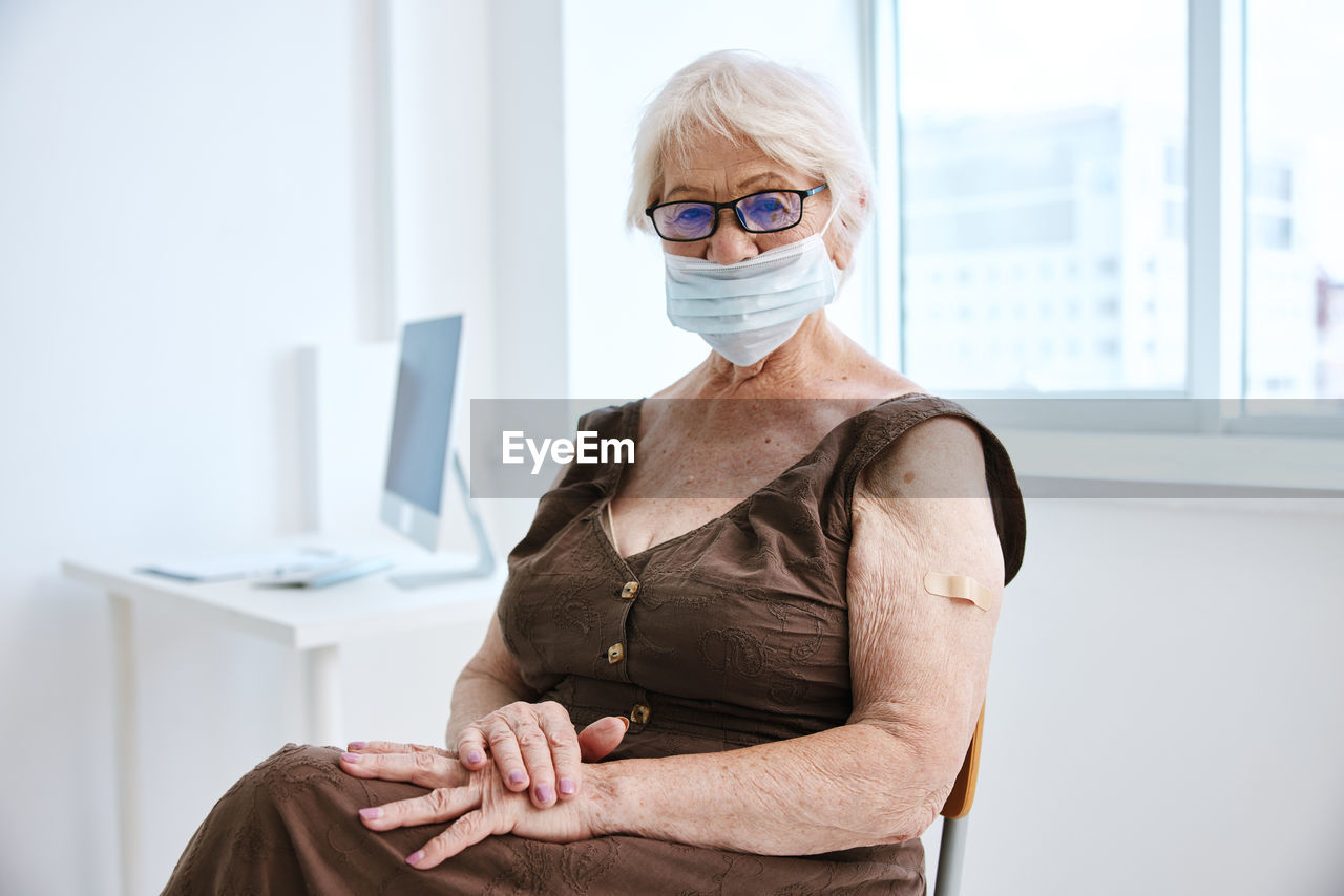 Portrait of woman wearing mask