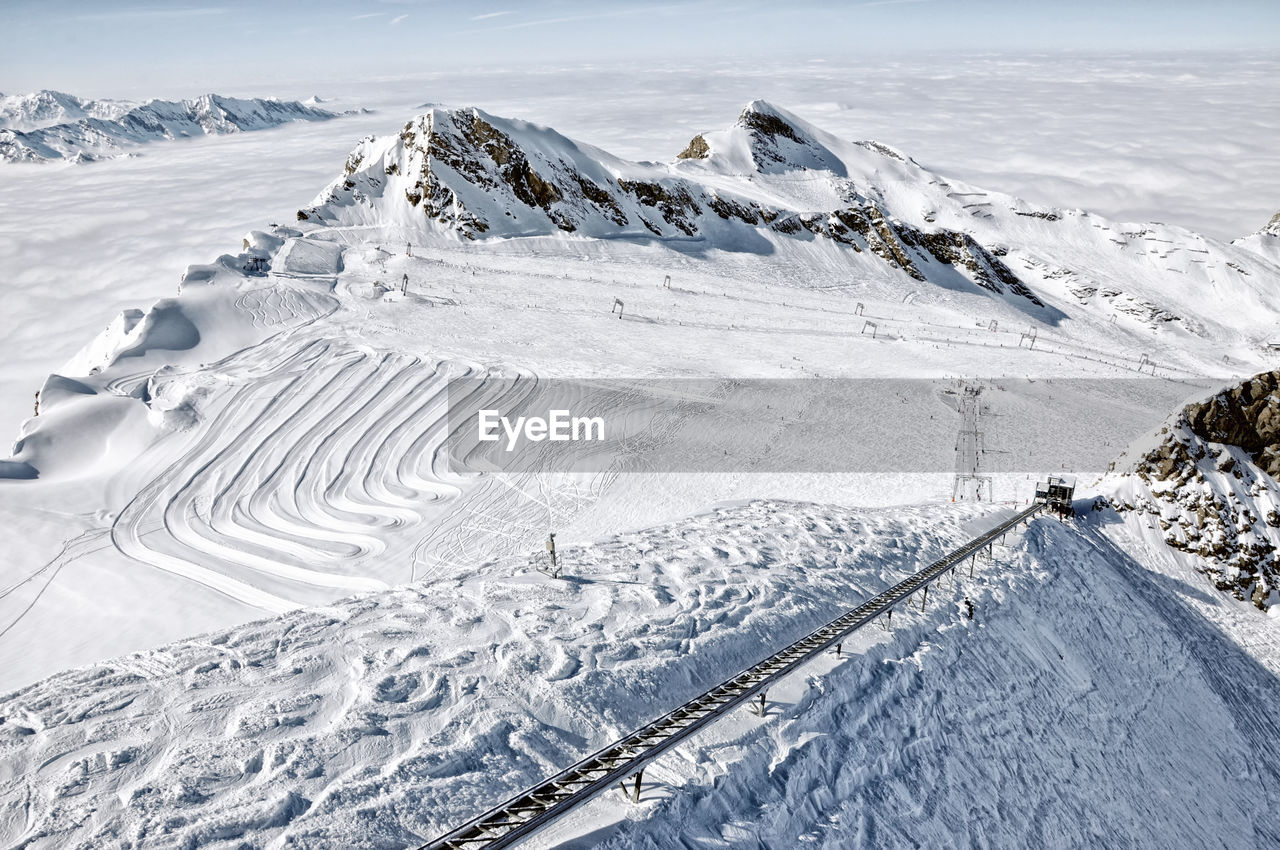 Ski resort in the alps. ski slopes, piste, powder snow in the mountains