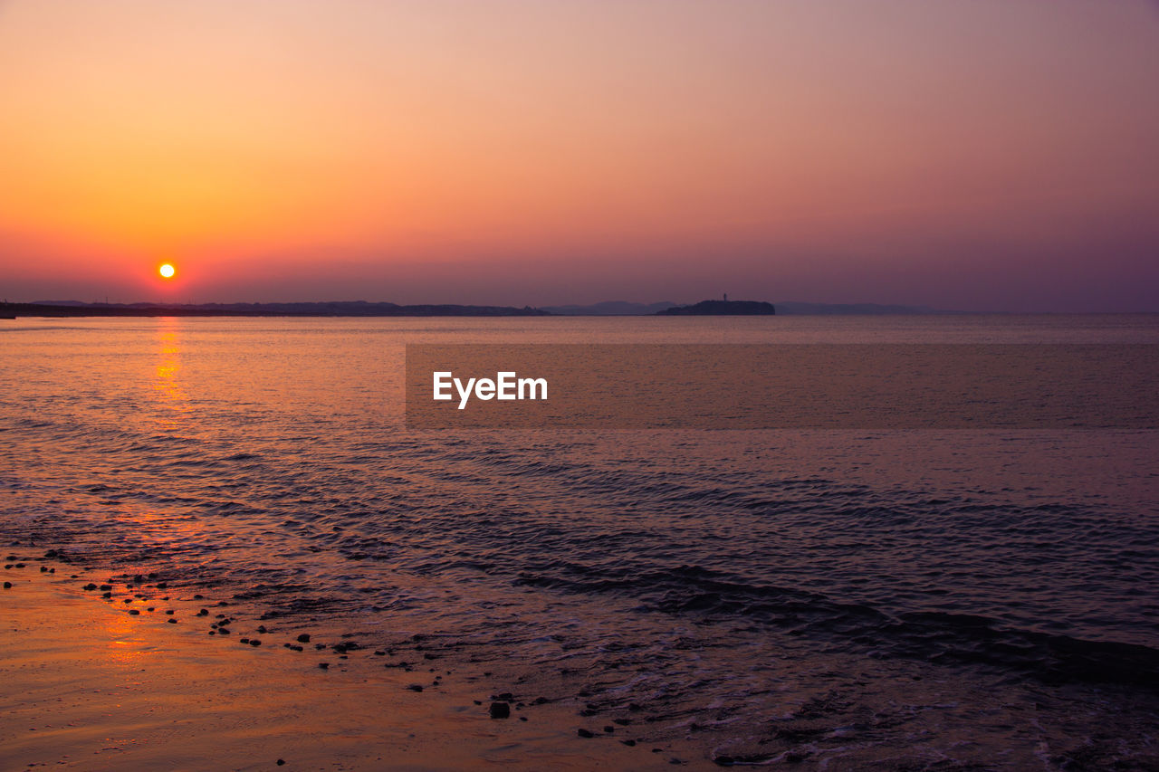 SCENIC VIEW OF SEA AGAINST ROMANTIC SKY