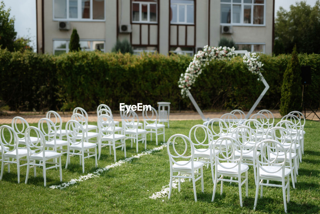 empty chairs and tables and table in park