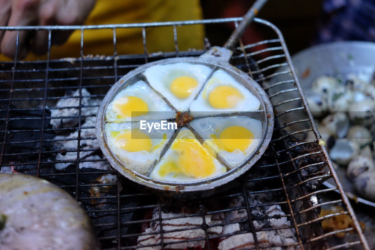 High angle view of food on barbecue grill