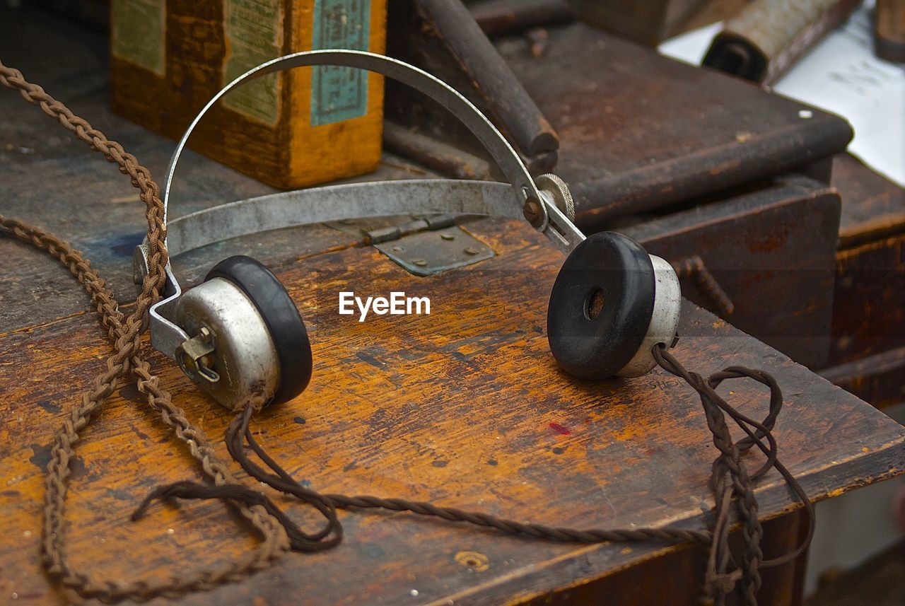 Close-up of vintage headphones on table