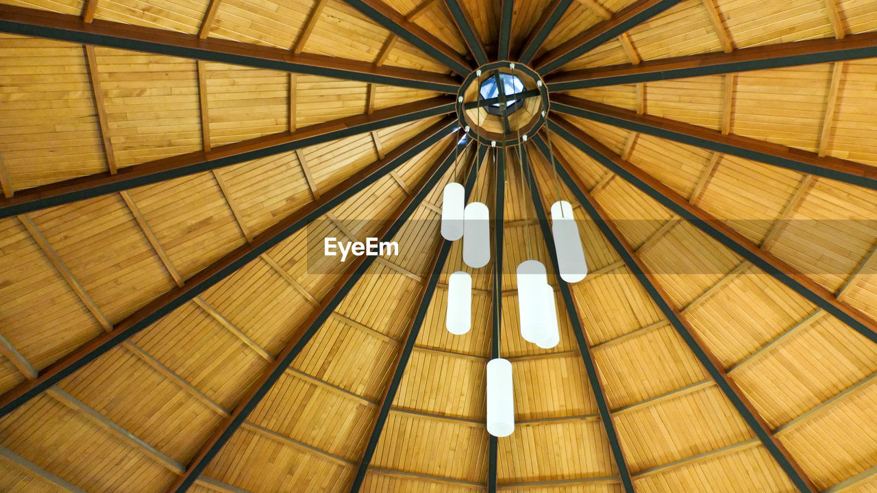 Closeup shot of an elegant and beautiful chandelier hanging on ceiling