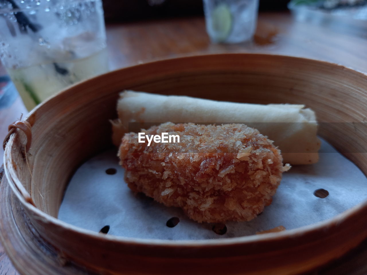 Dim sum food, crispy fried prawns and delicious chicken spring rolls
