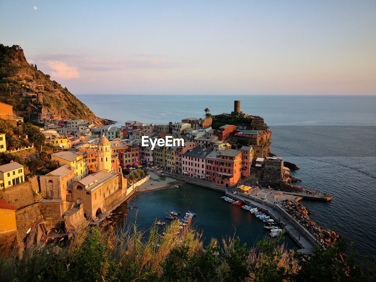 High angle view of buildings by sea