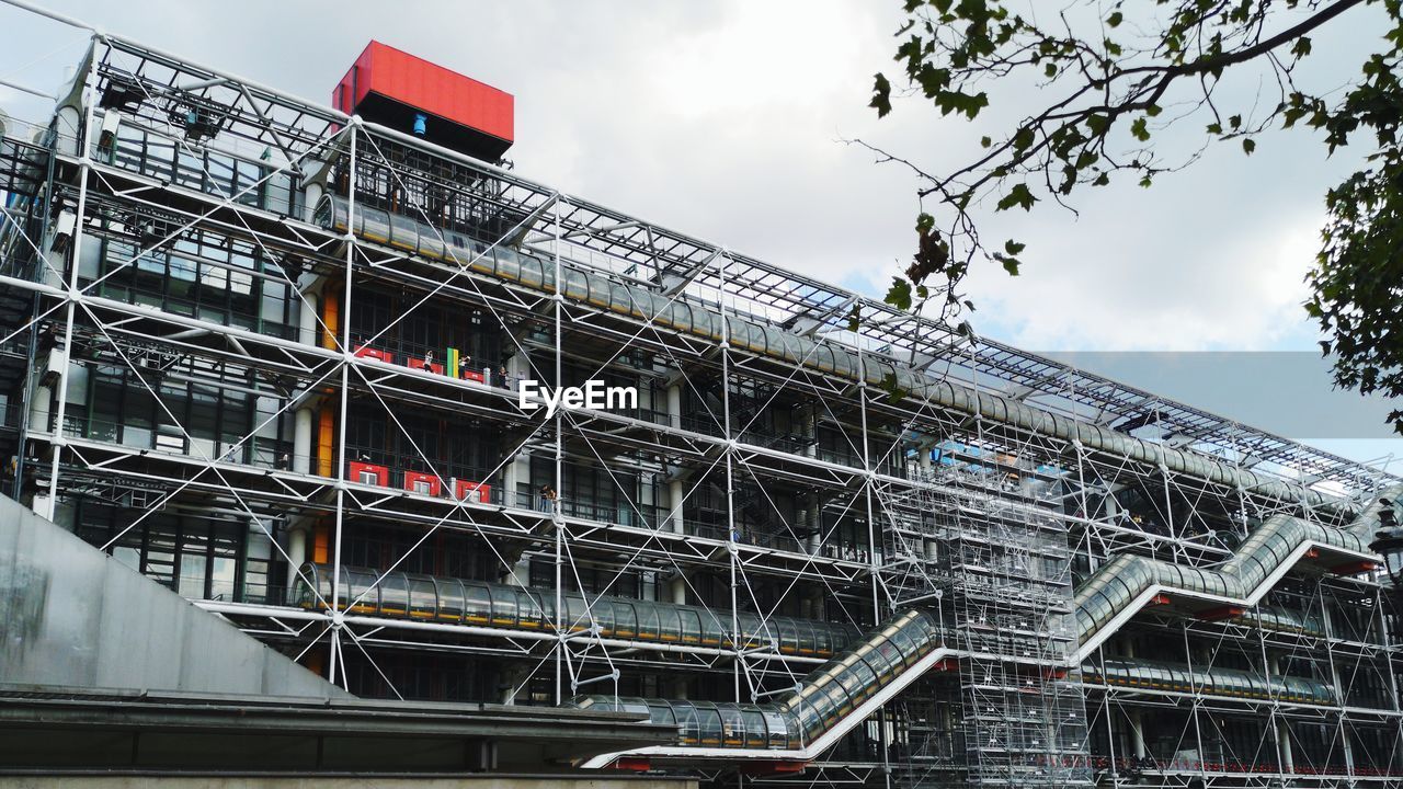 LOW ANGLE VIEW OF CONSTRUCTION SITE AGAINST SKY