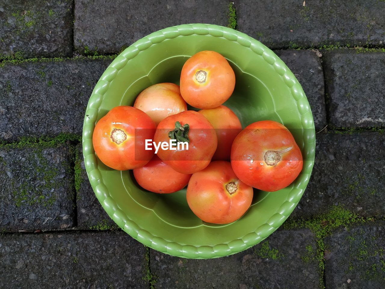 food, food and drink, plant, healthy eating, freshness, wellbeing, tomato, fruit, produce, high angle view, vegetable, citrus, directly above, no people, orange color, still life, plum tomato, green, large group of objects, tangerine, day, outdoors, container, red