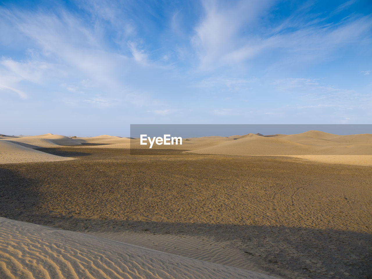 Scenic view of desert against sky