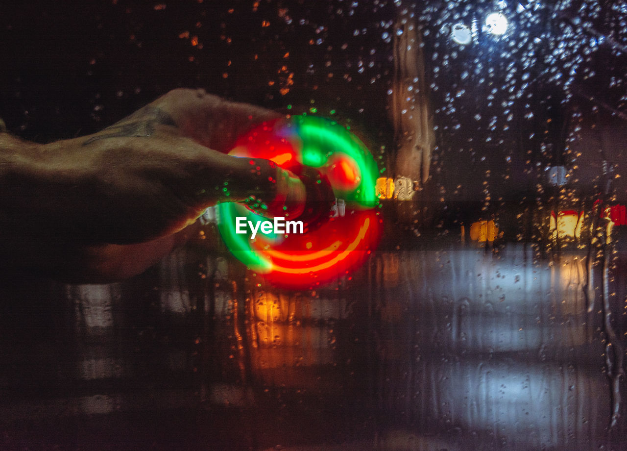 Close-up of illuminated light trails at night