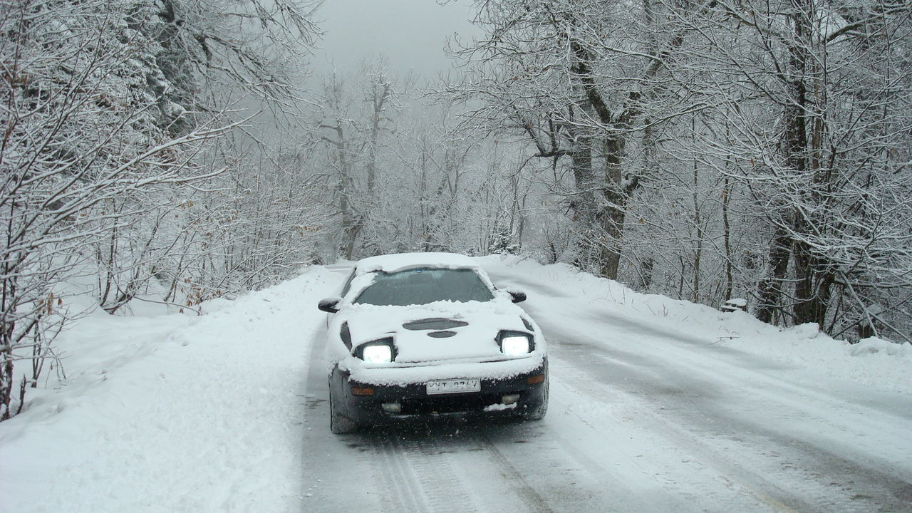 SNOW COVERED ROAD IN WINTER