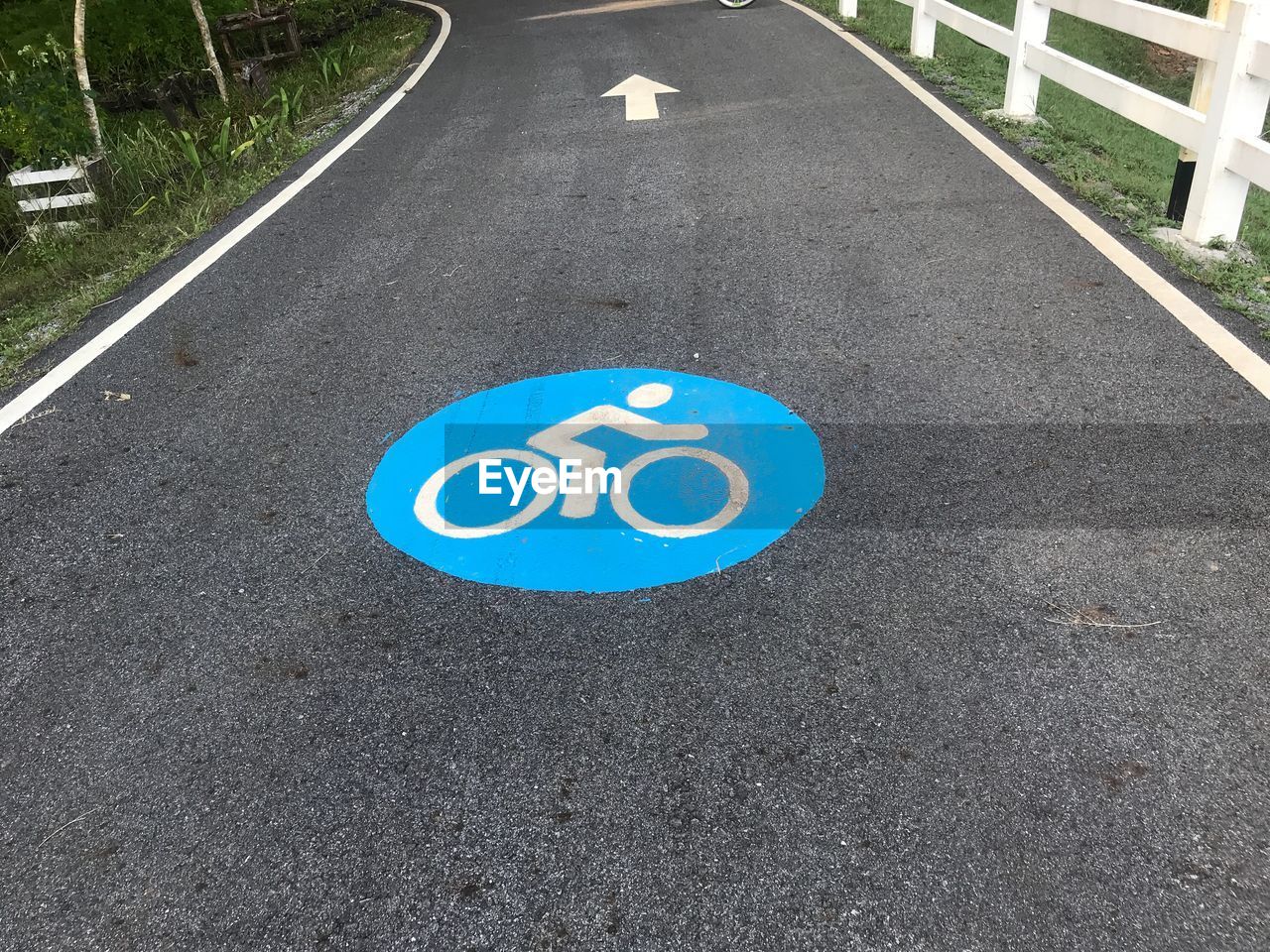 High angle view of bicycle sign on road