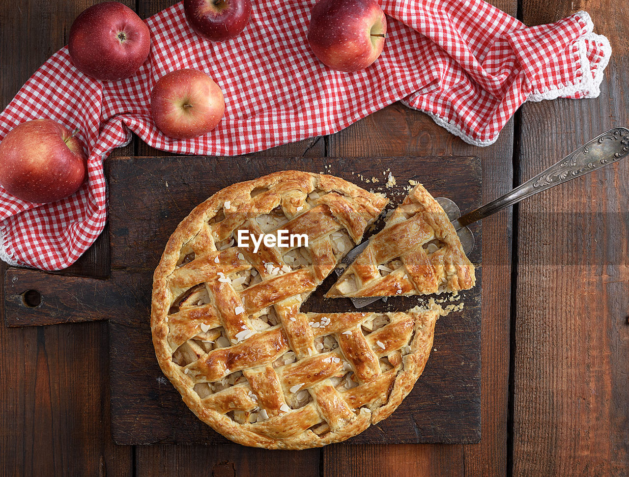 High angle view of pie with apples on table