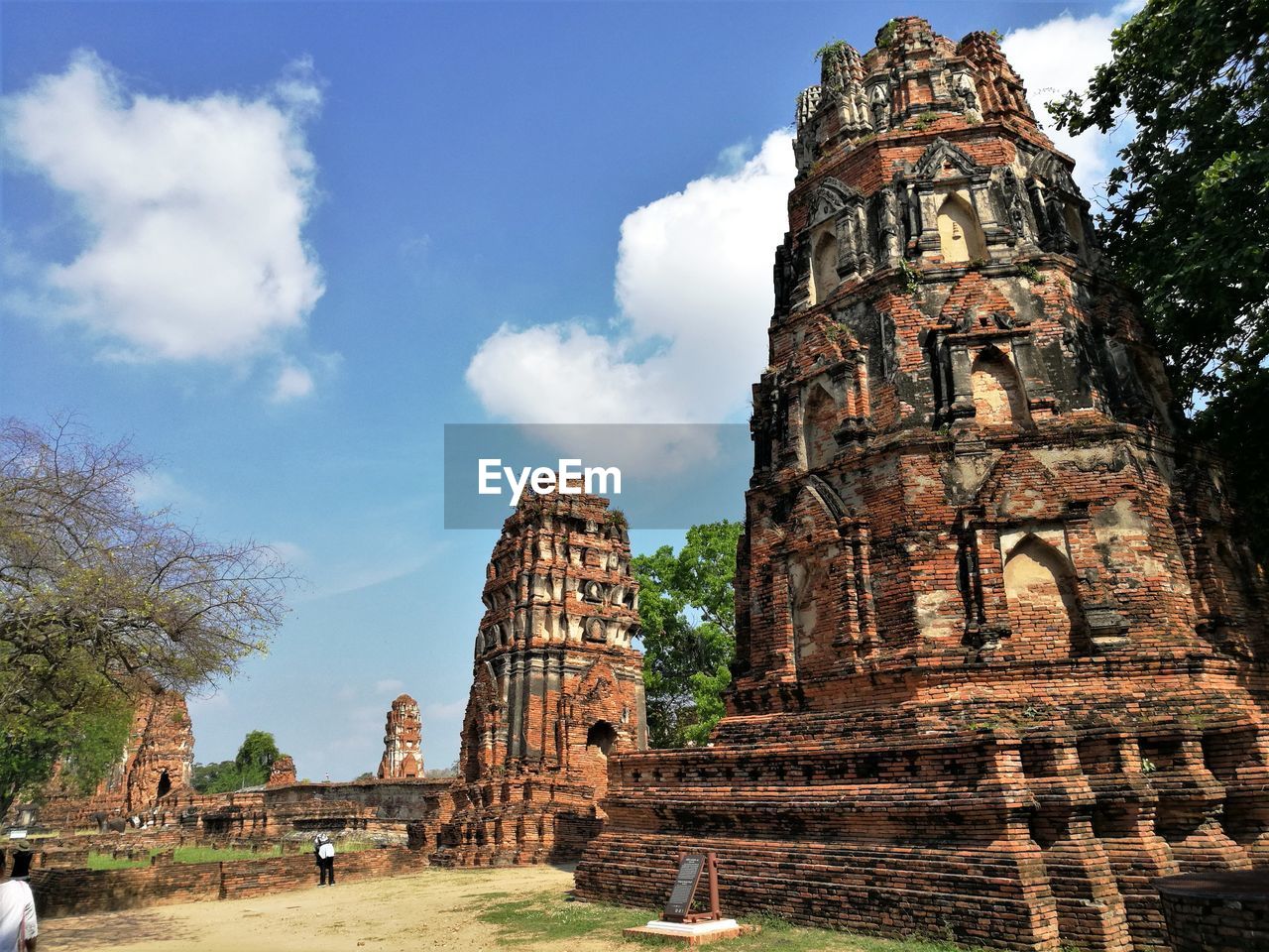 ANCIENT TEMPLE AGAINST BUILDING