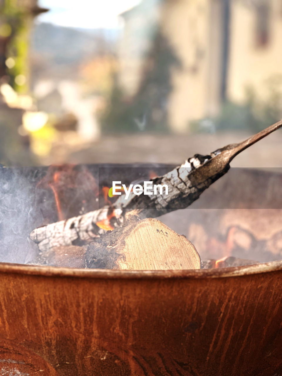 nature, focus on foreground, food and drink, burning, heat, day, wood, food, smoke, leaf, outdoors, no people, fire, sunlight, tree, close-up, kitchen utensil